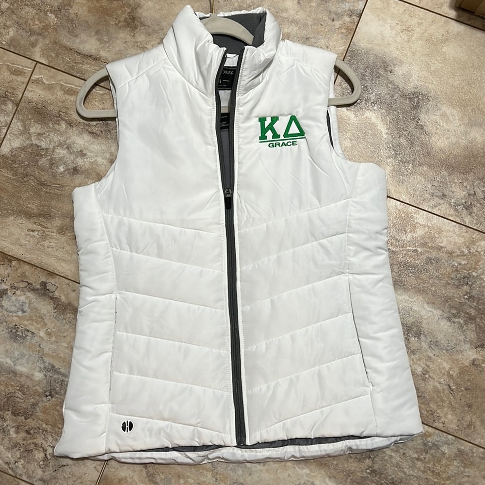 An embroidered ΚΔ vest